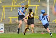28 July 2012; Katie Power, Kilkenny, scores her side's second goal of the game despite the attention of Dublin's Fiona Hayes, left, and Arlene Cushen, 5. All-Ireland Senior Camogie Championship, Quarter-Final Qualifier, Dublin v Kilkenny, O'Moore Park, Portlaoise, Co. Laois. Picture credit: Pat Murphy / SPORTSFILE