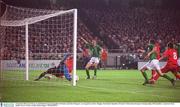 16 October 2002; Gary Breen, 5, and Robbie Keane,10, Republic of Ireland, watch the Irish goal , an own goal by Ludovic Magnin, Switzerland. Republic of Ireland v Switzerland, European Championships 2004 Qualifier, Lansdowne Road, Dublin. Soccer. Picture credit; Damien Eagers / SPORTSFILE