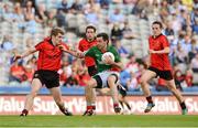 4 August 2012; Kevin McLoughlin, Mayo, in action against Conor Maginn, left, Kevin McKernan, and Conor Garvey, right, Down. GAA Football All-Ireland Senior Championship Quarter-Final, Down v Mayo, Croke Park, Dublin. Picture credit: Dáire Brennan / SPORTSFILE