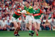 28 September 1997; Pa Laide of Kerry in action against Pat Holmes of Mayo during GAA Football All-Ireland Senior Championship Final match between Kerry and Mayo at Croke Park in Dublin. Photo by Ray McManus/Sportsfile