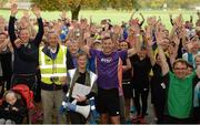 14 October 2017; Vhi ambassador and Olympian David Gillick and race director Ruth Bannon with runners at the start of the Malahide parkrun where Vhi hosted a special event to celebrate their partnership with parkrun Ireland. David was on hand to lead the warm up for parkrun participants before completing the 5km course alongside newcomers and seasoned parkrunners alike. Vhi provided walkers, joggers, runners and volunteers at Malahide parkrun with a variety of refreshments in the Vhi Relaxation Area at the finish line. A qualified physiotherapist was also available to guide participants through a post event stretching routine to ease those aching muscles. parkruns take place over a 5km course weekly, are free to enter and are open to all ages and abilities, providing a fun and safe environment to enjoy exercise. To register for a parkrun near you visit www.parkrun.ie. New registrants should select their chosen event as their home location. You will then receive a personal barcode which acts as your free entry to any parkrun event worldwide. Photo by Cody Glenn/Sportsfile