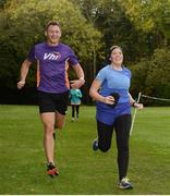 14 October 2017; Vhi ambassador and Olympian David Gillick encourages Lucia Castro, from Galicia, Spain, on the final straight during the Malahide parkrun where Vhi hosted a special event to celebrate their partnership with parkrun Ireland. David was on hand to lead the warm up for parkrun participants before completing the 5km course alongside newcomers and seasoned parkrunners alike. Vhi provided walkers, joggers, runners and volunteers at Malahide parkrun with a variety of refreshments in the Vhi Relaxation Area at the finish line. A qualified physiotherapist was also available to guide participants through a post event stretching routine to ease those aching muscles.  parkruns take place over a 5km course weekly, are free to enter and are open to all ages and abilities, providing a fun and safe environment to enjoy exercise. To register for a parkrun near you visit www.parkrun.ie. New registrants should select their chosen event as their home location. You will then receive a personal barcode which acts as your free entry to any parkrun event worldwide. Photo by Cody Glenn/Sportsfile