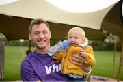 14 October 2017; Vhi ambassador and Olympian David Gillick and his son Oscar, age 1, during the Malahide parkrun where Vhi hosted a special event to celebrate their partnership with parkrun Ireland. David was on hand to lead the warm up for parkrun participants before completing the 5km course alongside newcomers and seasoned parkrunners alike. Vhi provided walkers, joggers, runners and volunteers at Malahide parkrun with a variety of refreshments in the Vhi Relaxation Area at the finish line. A qualified physiotherapist was also available to guide participants through a post event stretching routine to ease those aching muscles.  parkruns take place over a 5km course weekly, are free to enter and are open to all ages and abilities, providing a fun and safe environment to enjoy exercise. To register for a parkrun near you visit www.parkrun.ie. New registrants should select their chosen event as their home location. You will then receive a personal barcode which acts as your free entry to any parkrun event worldwide. Photo by Cody Glenn/Sportsfile