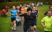 14 October 2017; Runners during the Malahide parkrun where Vhi ambassador and Olympian David Gillick also took part as Vhi hosted a special event to celebrate their partnership with parkrun Ireland. David was on hand to lead the warm up for parkrun participants before completing the 5km course alongside newcomers and seasoned parkrunners alike. Vhi provided walkers, joggers, runners and volunteers at Malahide parkrun with a variety of refreshments in the Vhi Relaxation Area at the finish line. A qualified physiotherapist was also available to guide participants through a post event stretching routine to ease those aching muscles.  parkruns take place over a 5km course weekly, are free to enter and are open to all ages and abilities, providing a fun and safe environment to enjoy exercise. To register for a parkrun near you visit www.parkrun.ie. New registrants should select their chosen event as their home location. You will then receive a personal barcode which acts as your free entry to any parkrun event worldwide. Photo by Cody Glenn/Sportsfile