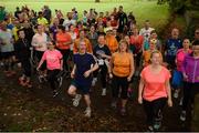 14 October 2017; Runners warm up ahead of the Malahide parkrun where Vhi ambassador and Olympian David Gillick took part as Vhi hosted a special event to celebrate their partnership with parkrun Ireland. David was on hand to lead the warm up for parkrun participants before completing the 5km course alongside newcomers and seasoned parkrunners alike. Vhi provided walkers, joggers, runners and volunteers at Malahide parkrun with a variety of refreshments in the Vhi Relaxation Area at the finish line. A qualified physiotherapist was also available to guide participants through a post event stretching routine to ease those aching muscles.  parkruns take place over a 5km course weekly, are free to enter and are open to all ages and abilities, providing a fun and safe environment to enjoy exercise. To register for a parkrun near you visit www.parkrun.ie. New registrants should select their chosen event as their home location. You will then receive a personal barcode which acts as your free entry to any parkrun event worldwide. Photo by Cody Glenn/Sportsfile