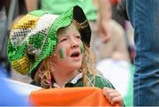 8 August 2012; A young supporter watches Katie Taylor in her Women's Light 60kg Semi-Final at the 2012 London Olympic Games, Killarney Road, Bray, Co. Wicklow. Picture credit: Pat Murphy / SPORTSFILE