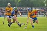 8 August 2012; Andrew Ryan, Tipperary, in action against Padraic Collins, Clare. Bord Gáis Energy Munster GAA Hurling Under 21 Championship Final, Bord Gáis Energy Munster GAA Hurling Under 21 Championship Final, Cusack Park, Ennis, Co. Clare. Picture credit: Diarmuid Greene / SPORTSFILE