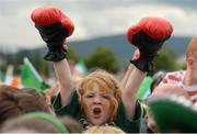 9 August 2012; A supporter celebrates near the end of Katie Taylor's Women's Light 60kg Final at the 2012 London Olympic Games, Shoreline Leisure Centre, Bray, Co. Wicklow. Picture credit: Pat Murphy / SPORTSFILE