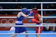 10 August 2012; Paddy Barnes, Ireland, left, exchanges punches with Shiming Zou, China, during their men's light fly 49kg semi-final contest. London 2012 Olympic Games, Boxing, South Arena 2, ExCeL Arena, Royal Victoria Dock, London, England. Picture credit: Stephen McCarthy / SPORTSFILE