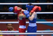 10 August 2012; Paddy Barnes, Ireland, right, exchanges punches with Shiming Zou, China, during their men's light fly 49kg semi-final contest. London 2012 Olympic Games, Boxing, South Arena 2, ExCeL Arena, Royal Victoria Dock, London, England. Picture credit: Stephen McCarthy / SPORTSFILE