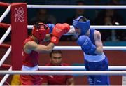 10 August 2012; Paddy Barnes, Ireland, right, exchanges punches with Shiming Zou, China, during their men's light fly 49kg semi-final contest. London 2012 Olympic Games, Boxing, South Arena 2, ExCeL Arena, Royal Victoria Dock, London, England. Picture credit: Stephen McCarthy / SPORTSFILE