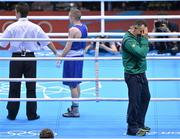 10 August 2012; A dejected Ireland head coach Billy Walsh, after Shiming Zou, China, is declared the winner in his men's light fly 49kg semi-final contest over Paddy Barnes, Ireland. London 2012 Olympic Games, Boxing, South Arena 2, ExCeL Arena, Royal Victoria Dock, London, England. Picture credit: Stephen McCarthy / SPORTSFILE