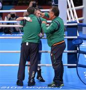 10 August 2012; Paddy Barnes, Ireland, is consoled by Team Ireland boxing head coach Billy Walsh, left, and Team Ireland boxing technical & tactical head coach Zaur Anita, after his defeat to Shiming Zou, China, in their men's light fly 49kg semi-final contest. London 2012 Olympic Games, Boxing, South Arena 2, ExCeL Arena, Royal Victoria Dock, London, England. Picture credit: Stephen McCarthy / SPORTSFILE