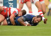 11 August 2012; Leo Auva'a, Leinster, goes over to score his side's first try despite the efforts of Dave Lewis, Gloucester. Pre-Season Friendly, Leinster v Gloucester, Tallaght Stadium, Tallaght, Co. Dublin. Photo by Sportsfile