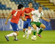 15 August 2012; Simon Cox, Republic of Ireland, in action against Milan Bisevac, Serbia. Friendly International, Serbia v Republic of Ireland, Red Star Stadium, Belgrade, Serbia. Picture credit: David Maher / SPORTSFILE