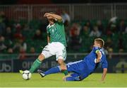 15 August 2012; Martin Paterson, Northern Ireland, in action against Niklas Moisander, Finland. Vauxhall International Challenge Match, Northern Ireland v Finland, Windsor Park, Belfast, Co. Antrim. Picture credit: Oliver McVeigh / SPORTSFILE