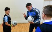24 October 2017; Dublin footballer Paddy Andrews was in Holy Spirit BNS in Ballymun today at an AIG Heroes event with pupils, Carl Dunne, 12, left, and Jamie Masterson, 10, both from Ballymun. The AIG Heroes initiative is a programme that leverages AIG’s sporting sponsorships to help provide positive role models and build confidence for young people in local communities. Photo by Sam Barnes/Sportsfile