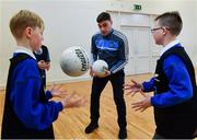 24 October 2017; Dublin footballer Paddy Andrews was in Holy Spirit BNS in Ballymun today at an AIG Heroes event with pupils, Corban Murphy, 10, left, and Jamie Masterson, 10, both from Ballymun. The AIG Heroes initiative is a programme that leverages AIG’s sporting sponsorships to help provide positive role models and build confidence for young people in local communities. Photo by Sam Barnes/Sportsfile