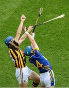 19 August 2012; Brian Hogan, Tipperary, fields the sliotar ahead of John O'Brien, Kilkenny. GAA Hurling All-Ireland Senior Championship Semi-Final, Kilkenny v Tipperary, Croke Park, Dublin. Picture credit: Brendan Moran / SPORTSFILE