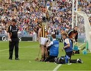 19 August 2012; Kilkenny manager Brian Cody looks on as Michael Fennelly receives attention before the parade. GAA Hurling All-Ireland Senior Championship Semi-Final, Kilkenny v Tipperary, Croke Park, Dublin. Picture credit: Ray McManus / SPORTSFILE