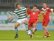 24 August 2012; Stephen Rice, Shamrock Rovers, in action against Shane Duggan, Cork City. 2012 FAI Ford Cup, Third Round, Shamrock Rovers v Cork City, Tallaght Stadium, Tallaght, Co. Dublin. Picture credit: Pat Murphy / SPORTSFILE