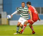 24 August 2012; Chris Turner, Shamrock Rovers, in action against Kevin Murray, Cork City. 2012 FAI Ford Cup, Third Round, Shamrock Rovers v Cork City, Tallaght Stadium, Tallaght, Co. Dublin. Picture credit: Pat Murphy / SPORTSFILE
