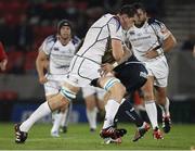 24 August 2012; Devin Toner, Leinster, is tackled by Danny Cipriani, Sale Sharks. Pre-Season Friendly, Sale Sharks v Leinster, Salford City Stadium, Manchester, England. Picture credit: Matt Impey / SPORTSFILE