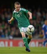 15 August 2012; Shane Ferguson, Northern Ireland, shoots to score his side's first goal. Vauxhall International Challenge Match, Northern Ireland v Finland, Windsor Park, Belfast, Co. Antrim. Picture credit: Oliver McVeigh / SPORTSFILE