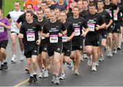 25 August 2012; Gearóid Ó Briain, left, and Emmett Farrelly, right, lead their group of the Irish Air Corps, during the Frank Duffy 10 Mile. Phoenix Park, Dublin. Picture credit: Tomas Greally / SPORTSFILE