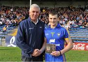 25 August 2012; Seadna Morey, Clare, is presented with the Bord Gáis Energy Man of the Match award by Ger Cunningham, Sports Ambassador with Bord Gáis Energy. Bord Gáis Energy GAA Hurling Under-21 All-Ireland Championship Semi-Final, Clare v Antrim, Semple Stadium, Thurles, Co. Tipperary. Picture credit: Diarmuid Greene / SPORTSFILE