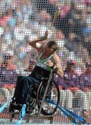 31 August 2012; Ireland's John McCarthy, from Dunmanway, Co. Cork, competes in the club throw - F51 final. London 2012 Paralympic Games, Athletics, Olympic Stadium, Olympic Park, Stratford, London, England. Picture credit: Brian Lawless / SPORTSFILE