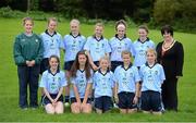 2 September 2012; Representing Dublin in the INTO/RESPECT Exhibition GoGames at the GAA Football All-Ireland Senior Championship Semi-Final between Dublin and Mayo, back, from left, Fiona Walsh, manager, Aobha Ó Gormáin, Gaelscoil Osraí Loch Buí, Co. Kilkenny, Odile Fitzpatrick, Paddock National School, Mountrath, Co. Laois, Olivia Deverell, Naomh Eon, Killenard, Portarlington, Co. Laois, Lisa Keegan, St Mel's National School, Ardagh, Co. Longford, Emer Lawless, St Mary's P.S, Edenderry, Co. Offaly, and INTO President Anne Fay, with front, from left, Khloie Andrews, St Bernard's National School, Abbeylara, Co. Longford, Sophie Gannon, St Patrick's GNS, Ringsend, Dublin, Ella Parke, Grangecon National School, Grangecon, Dunlavin, Co. Wicklow, Marie Kealy, Grangecon National School, Grangecon, Dunlavin, Co. Wicklow, and Abbie Dunne, St Colman's National School, Muchlagh, Tullamore, Co. Offaly. Croke Park, Dublin. Picture credit: Brendan Moran / SPORTSFILE