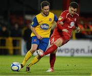 10 September 2012; Mark Quigley, Sligo Rovers, in action against Stephen McDonnell, Dundalk. Airtricity League Premier Division, Sligo Rovers v Dundalk, The Showgrounds, Sligo. Picture credit: Oliver McVeigh / SPORTSFILE