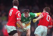 1 November 1998; Ciaran McManus of Offaly in action against Nicholas Murphy, left, and Brendan Walsh of Cork during the Church & General National Football League match between Offaly and Cork at O'Connor Park in Tullamore, Offaly. Photo by David Maher/Sportsfile