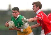 1 November 1998; James Grennan of Offaly in action against Nicholas Murphy of Cork during the Church & General National Football League match between Offaly and Cork at O'Connor Park in Tullamore, Offaly. Photo by David Maher/Sportsfile