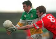 1 November 1998; James Grennan of Offaly in action against Nicholas Murphy of Cork during the Church & General National Football League match between Offaly and Cork at O'Connor Park in Tullamore, Offaly. Photo by David Maher/Sportsfile