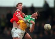 1 November 1998; James Grennan of Offaly in action against Nicholas Murphy of Cork during the Church & General National Football League match between Offaly and Cork at O'Connor Park in Tullamore, Offaly. Photo by David Maher/Sportsfile