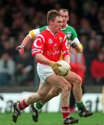 1 November 1998; Brendan Walsh of Offaly in action against John Kenny of Cork during the Church & General National Football League match between Offaly and Cork at O'Connor Park in Tullamore, Offaly. Photo by David Maher/Sportsfile