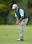 14 September 2012; Former Kilkenny hurler Eddie Keher, representing Rower Inistioge, Co. Kilkenny, watches his putt on the 12th green during the 13th Annual All-Ireland GAA Golf Challenge 2012 Finals. Waterford Castle Golf Club, Waterford. Picture credit: Brendan Moran / SPORTSFILE