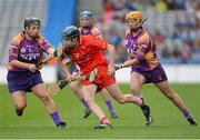 16 September 2012; Pamela Mackey, Cork, in action against Ursula Jacob, left, and Deirdre Codd, Wexford. All-Ireland Senior Camogie Championship Final, Cork v Wexford, Croke Park, Dublin. Picture credit: Matt Browne / SPORTSFILE