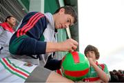 14 September 2012; Mayo's Alan Freeman signs an autograph during an open supporters night ahead of their side's GAA Football All-Ireland Senior Championship Final game against Donegal on Sunday 23rd September. Mayo Open Training Night, Elverys MacHale Park, Castlebar, Co. Mayo. Picture credit: Pat Murphy / SPORTSFILE