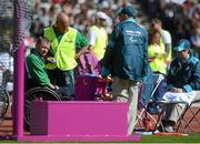 31 August 2012; Ireland's John McCarthy, from Dunmanway, Co. Cork, with Michael Bergin, ahead of competing in the club throw - F51 final. London 2012 Paralympic Games, Athletics, Olympic Stadium, Olympic Park, Stratford, London, England. Picture credit: Brian Lawless / SPORTSFILE