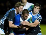 21 September 2012; Gavin Duffy, Connacht, is tackled by Scott Wight and Alex Dunbar, right, Glasgow Warriors. Celtic League 2012/13, Round 4, Glasgow Warriors v Connacht, Scotstoun Stadium, Glasgow, Scotland. Picture credit: Craig Watson / SPORTSFILE