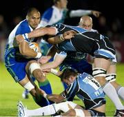 21 September 2012; George Naoupu, Connacht, is tackled by Al Kellock and Ryan Wilson, bottom, Glasgow Warriors. Celtic League 2012/13, Round 4, Glasgow Warriors v Connacht, Scotstoun Stadium, Glasgow, Scotland. Picture credit: Craig Watson / SPORTSFILE