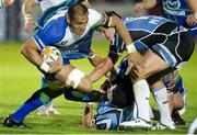 21 September 2012; George Naoupu, Connacht, is tackled by Tim Swinson, right, and Peter Murchie, Glasgow Warriors. Celtic League 2012/13, Round 4, Glasgow Warriors v Connacht, Scotstoun Stadium, Glasgow, Scotland. Picture credit: Craig Watson / SPORTSFILE