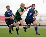 21 September 2012; Ed Byrne, Leinster, with support from team-mate Bryan Byrne, left, is tackled by Darragh Leader, Connacht. Under 20 Interprovincial, Connacht v Leinster, Sportsground, Galway. Picture credit: Stephen McCarthy / SPORTSFILE