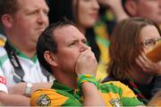 23 September 2012; A Donegal supporter watches the final minutes of the game. Supporters at GAA Football All-Ireland Championship Finals, Croke Park, Dublin. Picture credit: Pat Murphy / SPORTSFILE