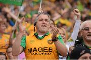 23 September 2012; A Donegal supporter celebrates a score during the game. Supporters at GAA Football All-Ireland Championship Finals, Croke Park, Dublin. Picture credit: Pat Murphy / SPORTSFILE
