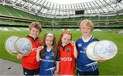 3 October 2012; Make a Wish, in conjunction with Bank of Ireland is inviting Leinster v Munster match attendees to help set a new Guinness World Record for the &quot;most tossed coins simultaneously&quot; in Aviva Stadium on Saturday 6th October. Helping promote the event is young rugby fans Ben Merry Munster, Karla Woods, Leinster, Natashia Mulligan, Munster and Calum McDonald, Leinster. Aviva Stadium, Lansdowne Road, Dublin. Picture credit: Brendan Moran / SPORTSFILE