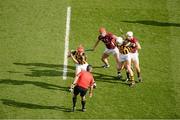 30 September 2012; Referee James McGrath throws in the ball to start the game between Kilkenny players Cillian Buckley, left, and Michael Fennelly, and Galway players, Iarla Tannian, left, and Andy Smith. GAA Hurling All-Ireland Senior Championship Final Replay, Kilkenny v Galway, Croke Park, Dublin. Picture credit: Daire Brennan / SPORTSFILE